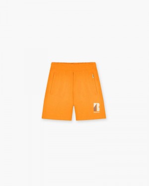 Men's Represent Decade Of Speed Shorts Orange | UK-UASGV4189