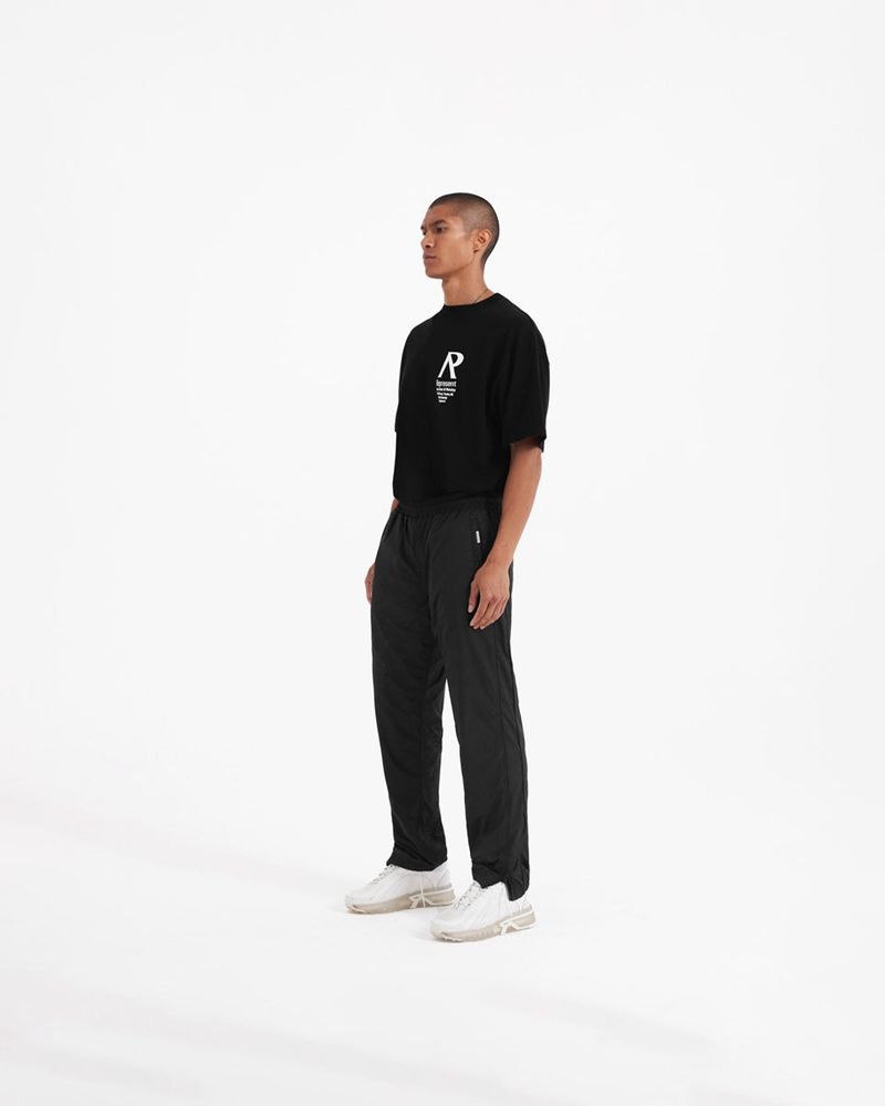 Men's Represent All Over Logo Track Trousers Black | UK-NEMOL3215